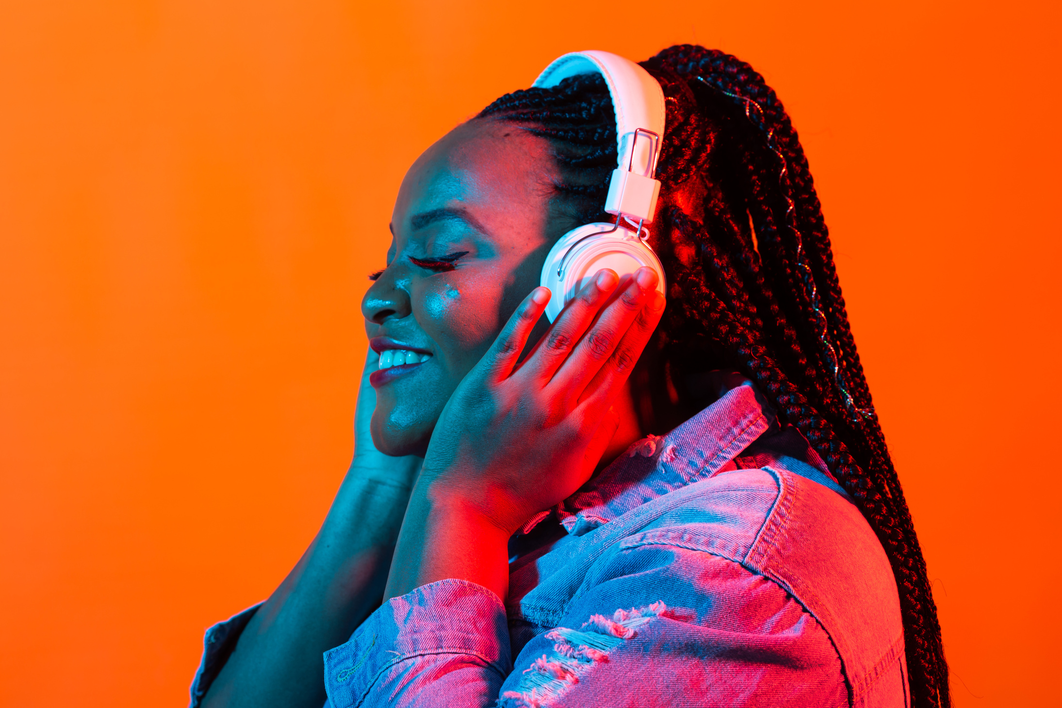 Neon Portrait of Young Black Woman Listen to Music in Headphones.